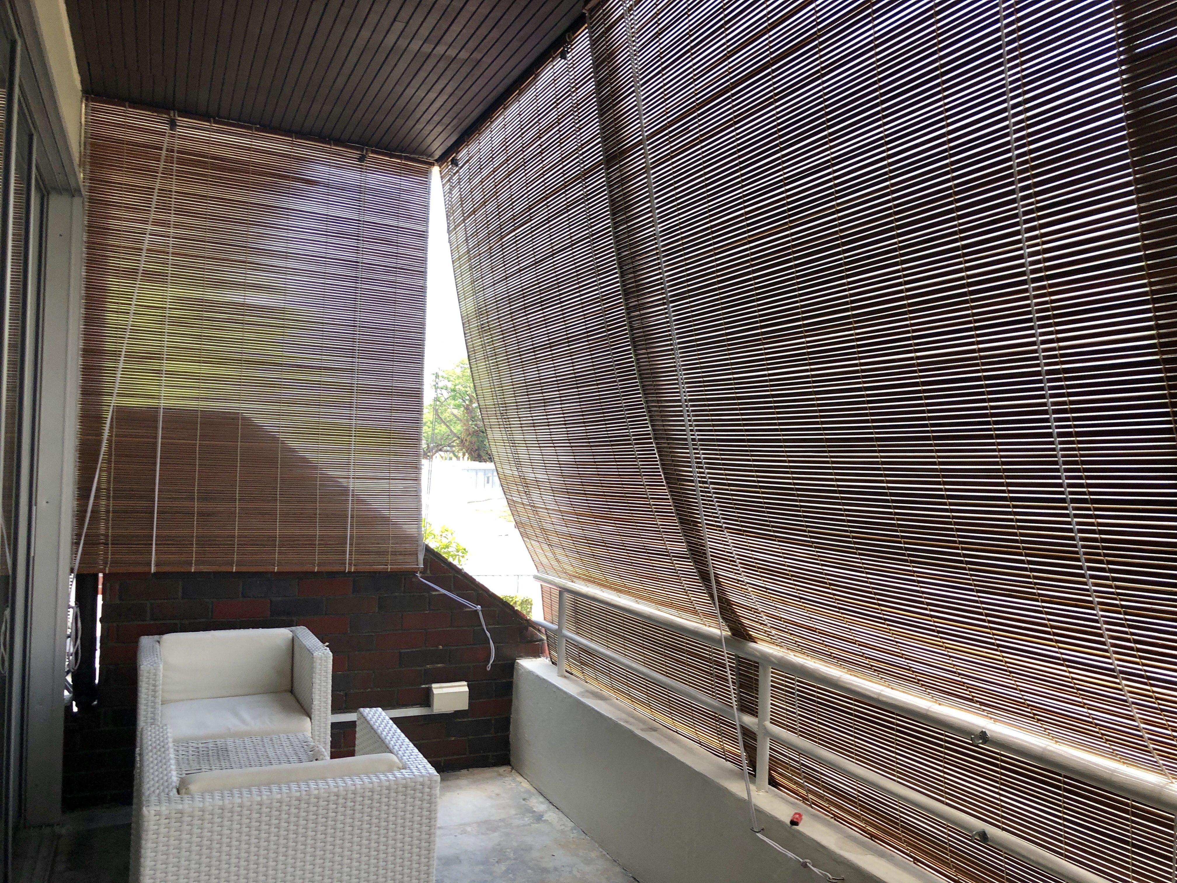 Outdoor balcony with the blinds are lowered down