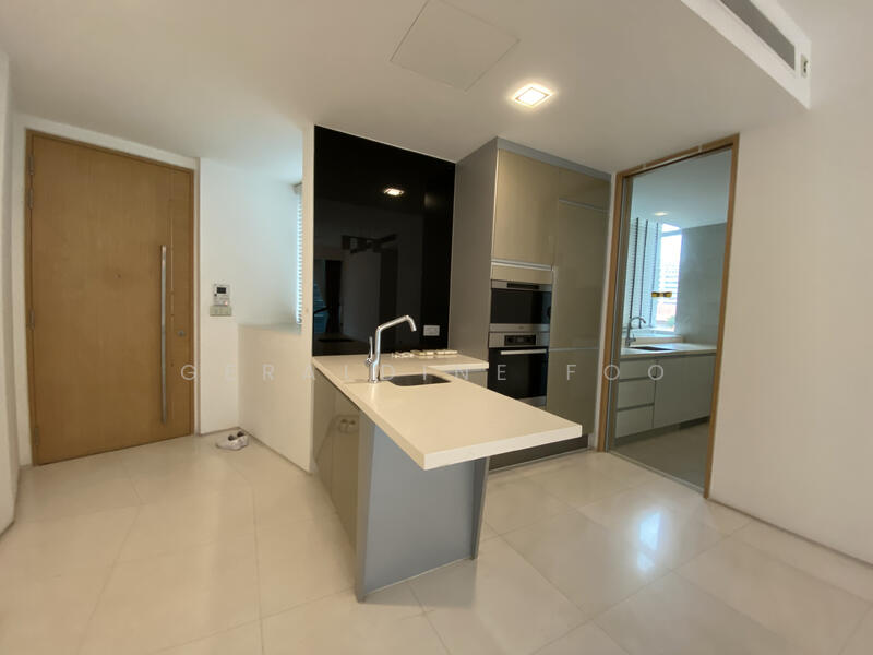 Dry kitchen with fridge, steam oven, conventional oven.