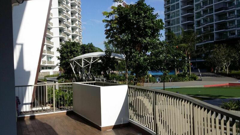 Balcony overlooking pool and greenery