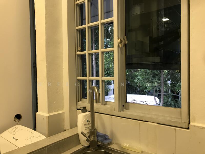 Wash sink next to window 