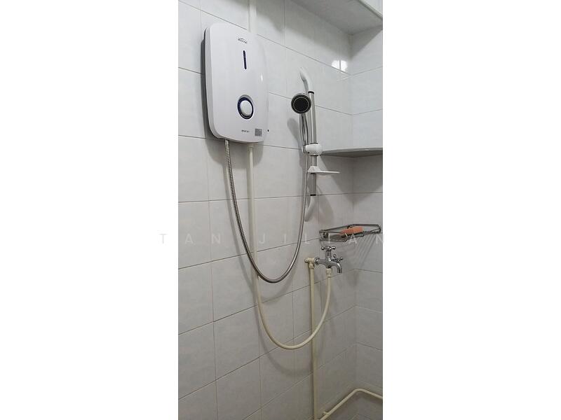Instant water heater in common toilet # 2