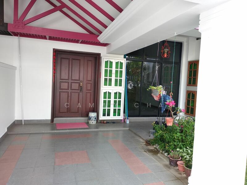 Main entrance porch. Garden on the right