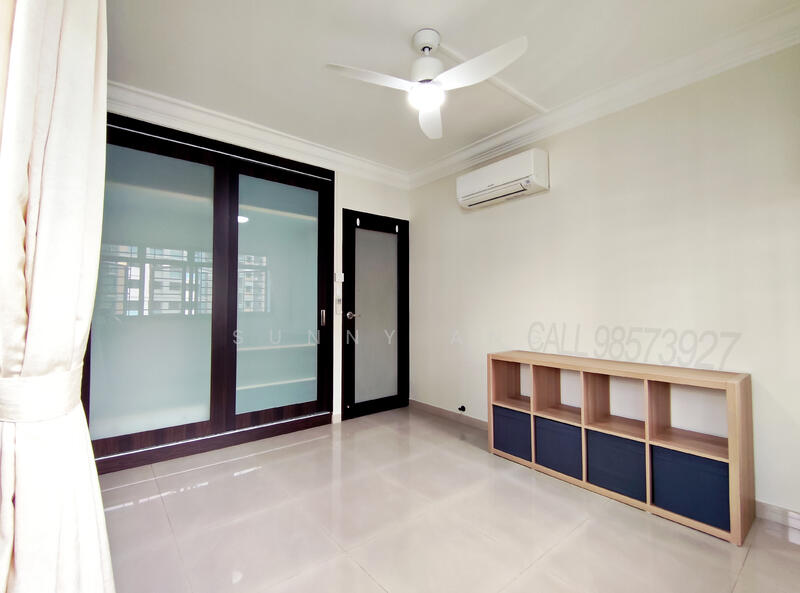 common room 2 has a spacious built-in wardrobe and display shelving.