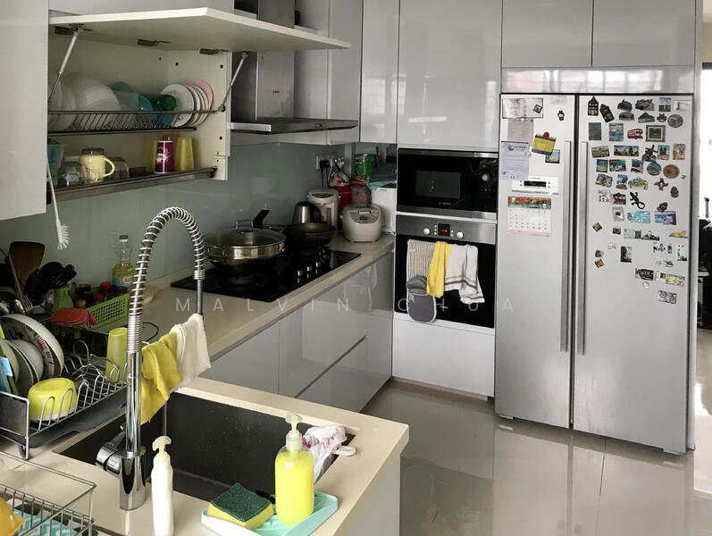 Well equipped kitchen with French door fridge and oven