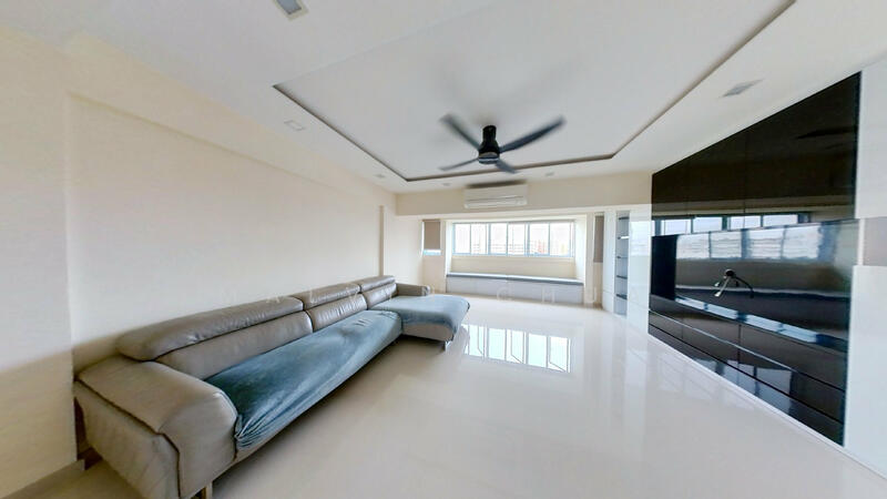 Spacious living room with bay window storage.