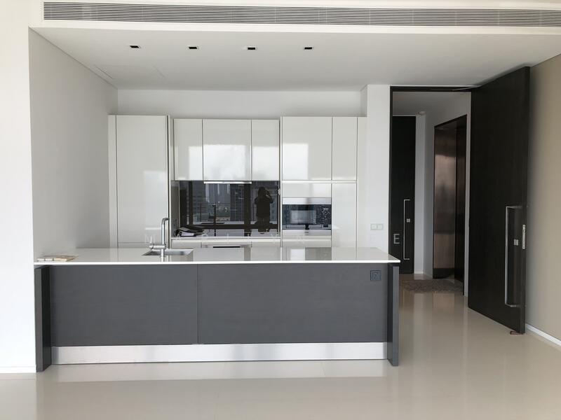 Entrance from private lift lobby into open-concept kitchen and living
