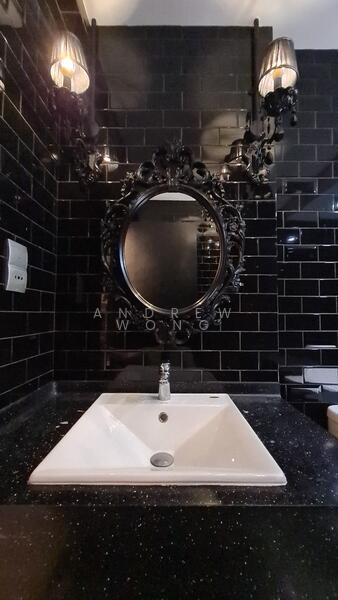 Black Victorian mirror in common bathroom