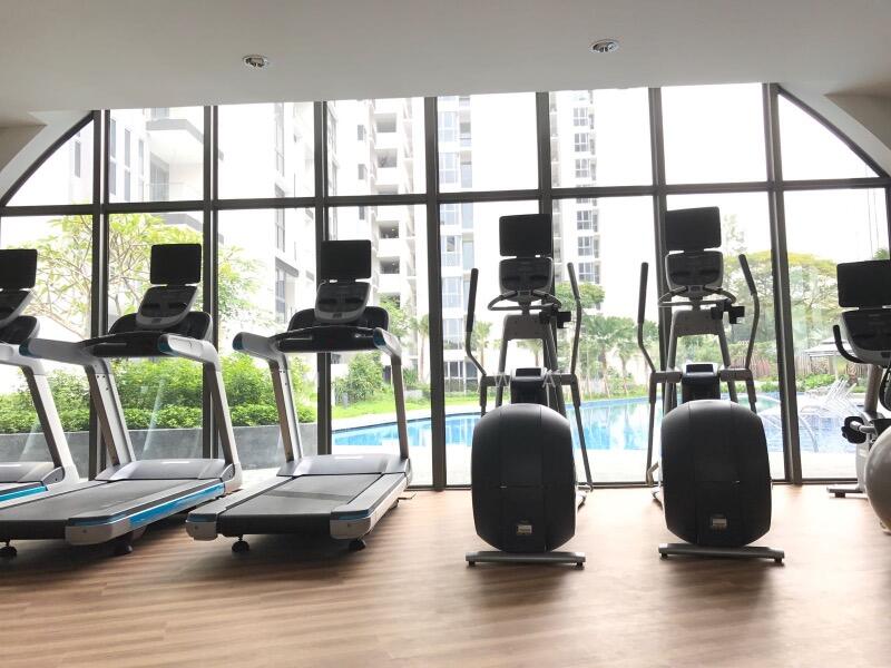 Pool facing fully equipped gym room 