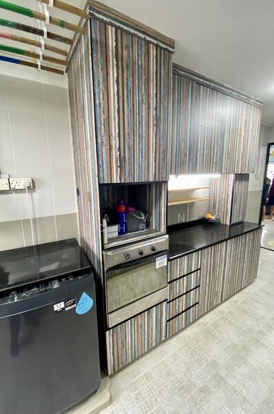 Pantry area with oven and washing machine.