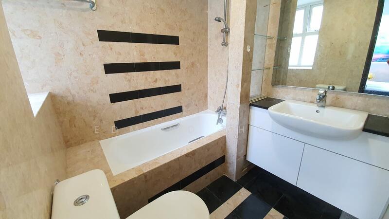 Ensuite bathroom with bathtub