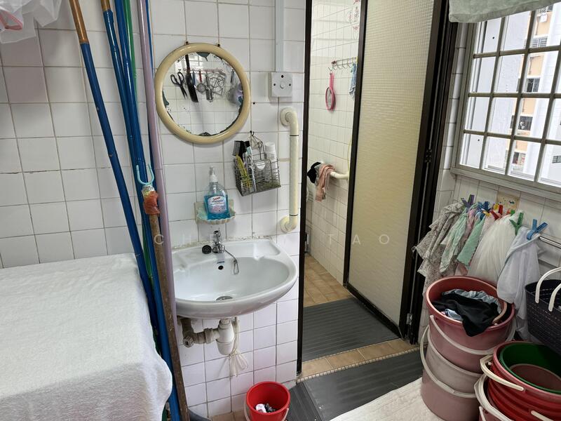 vanity area with washing machine