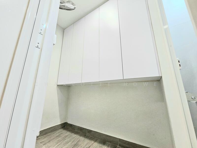 Helper's room with wall to wall storage