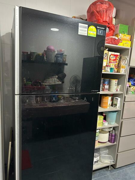 Refrigerator in kitchen