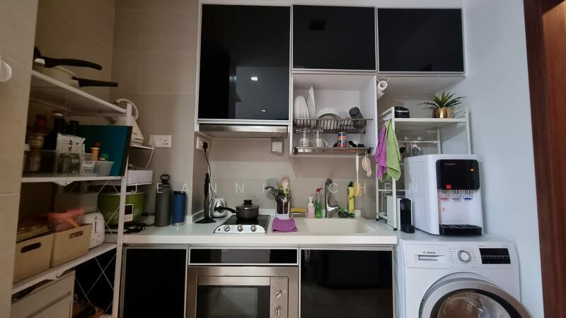 well  organized and equipped kitchen with water dispenser