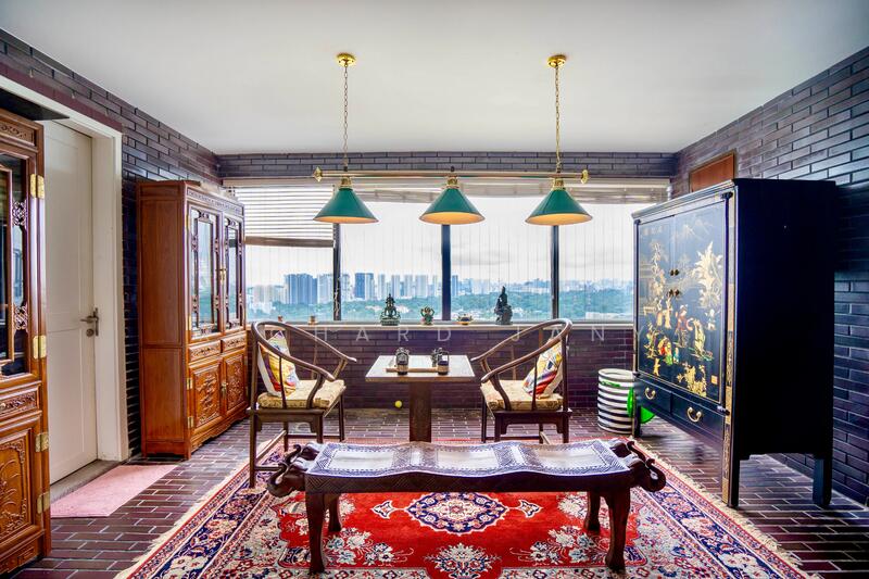 Enclosed balcony framed with skyline views for year-round comfort