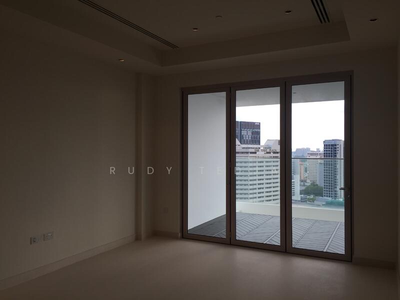 common bedroom with attached balcony