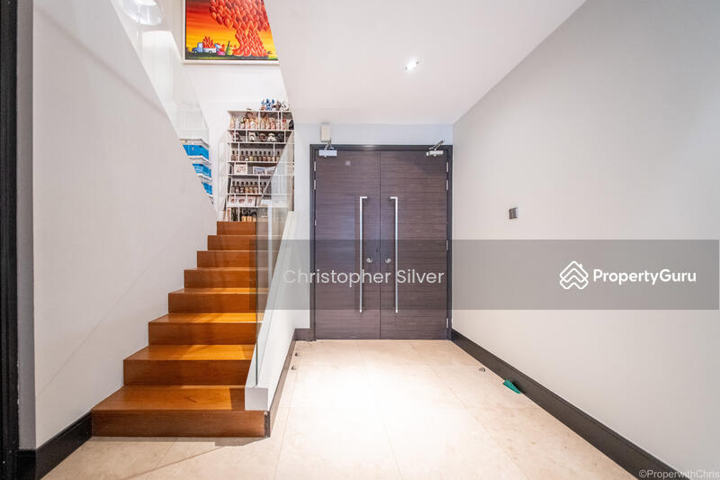 Entrance Foyer + Stairs to Rooms