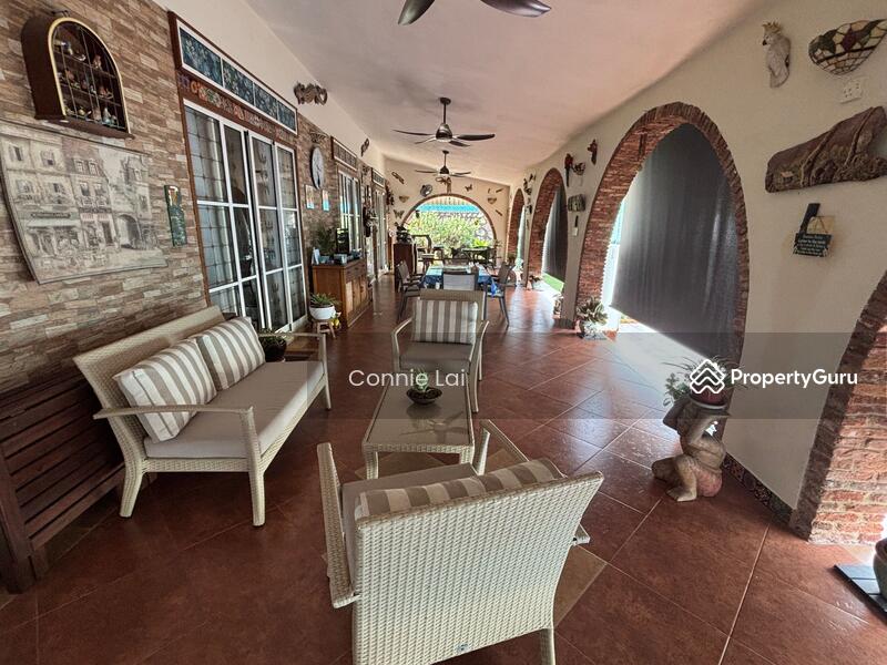 Patio overlooking the pool n greenery 