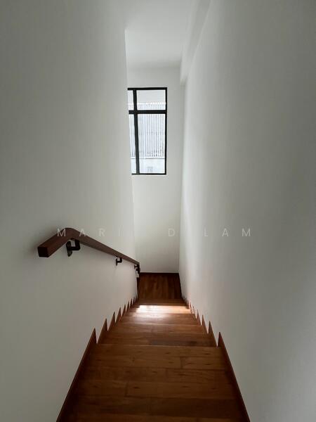 Stairs to master bedroom with natural light 