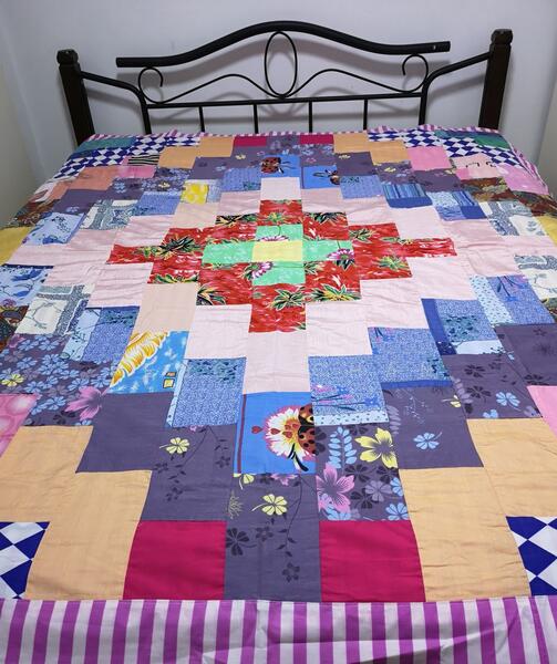 Master Room with patchwork bedspread