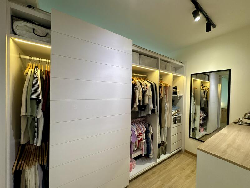 Walk-in wardrobe beside Master Bathroom