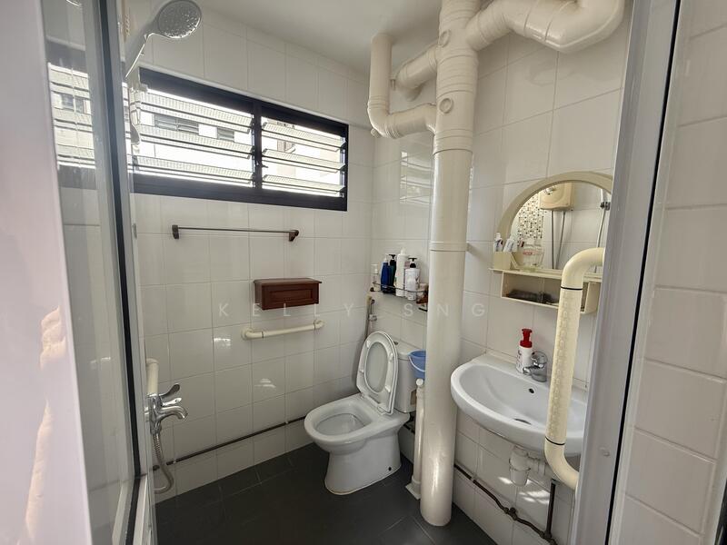 Well-maintained kitchen toilet.