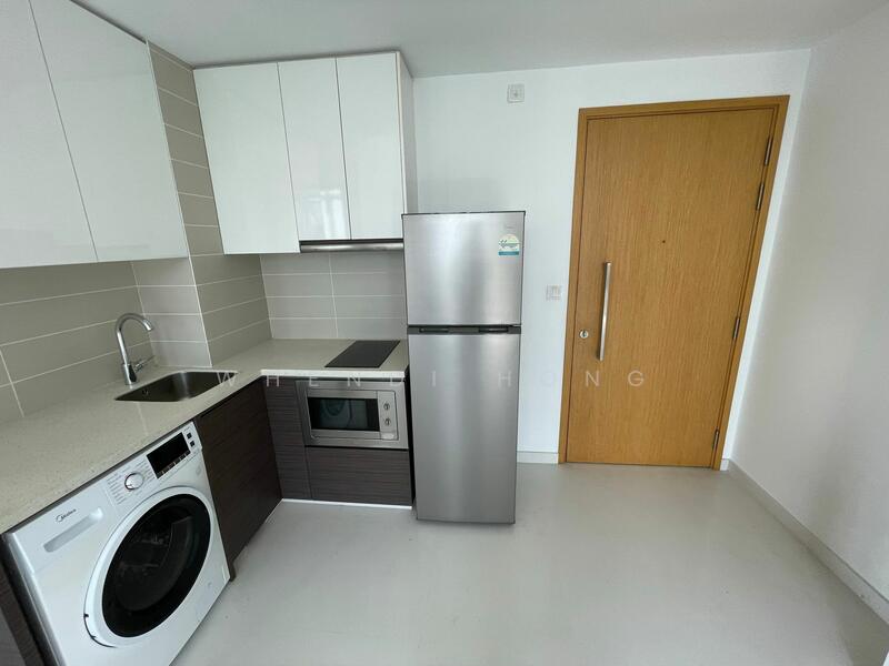 Well kept spacious area for cooking.