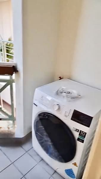 West Bay Condo, 50 West Coast Crescent, 1 Bedroom, 420 sqft, Condominium For Rent, by Esther Low, 500070234 - Yard area with washer - PropertyGuru.com.sg