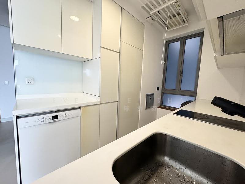 Functional Tuck-in Kitchen with Windows