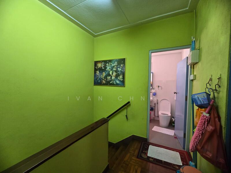 Don't let the bright paint deter you, with simple sprucing and fixing this space can be updated 