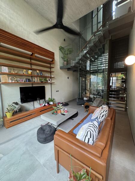 Living room has a very high ceiling