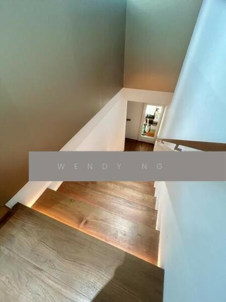 Well lit up stairs leading to…