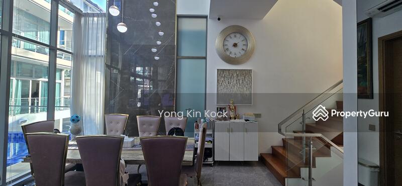 Dining Area with high ceiling