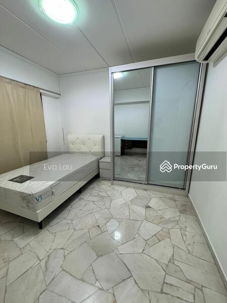 Bedroom with window and curtain