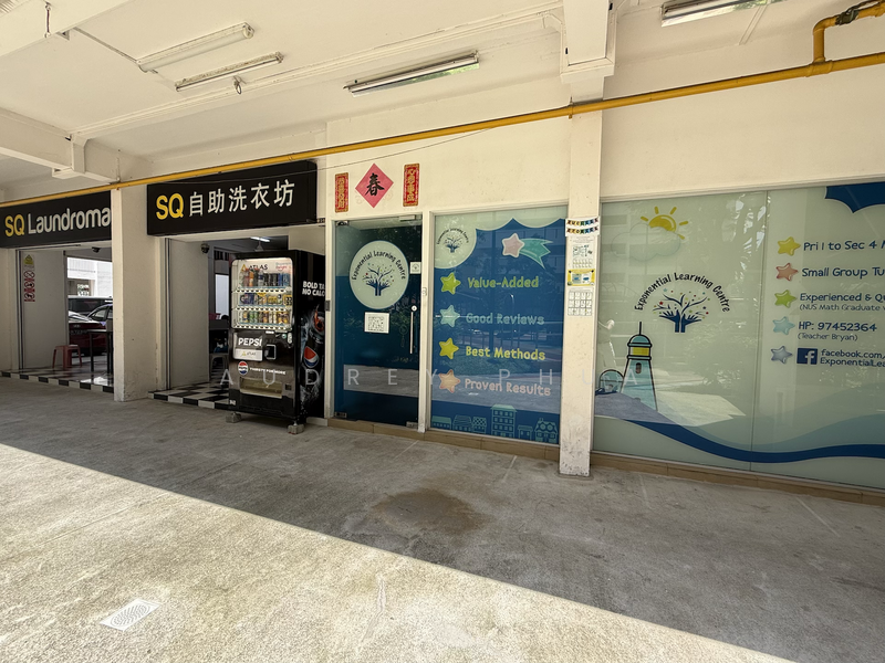 Laundromat, provision shops below block