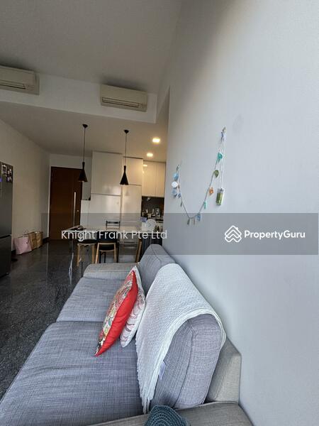 living room with high ceiling