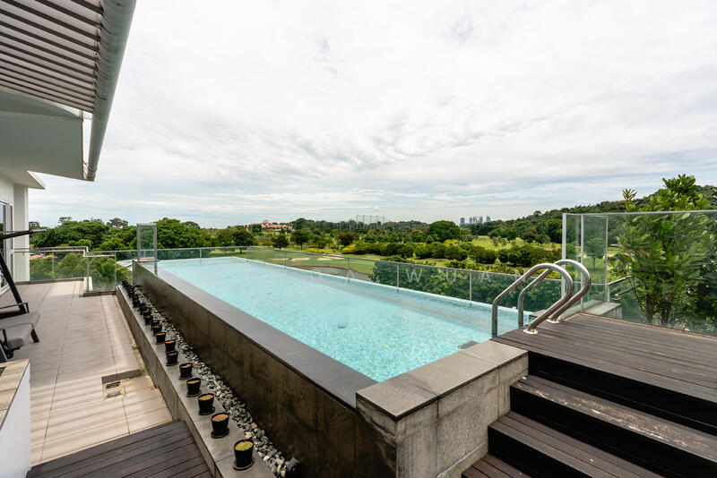 Infinity pool with golf course view