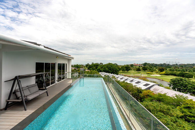 Infinity pool with golf course view