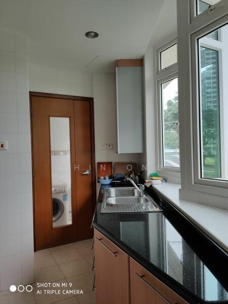 Kitchen overlook greenery as well. Utility area beside kitchen, separated by wooden door
