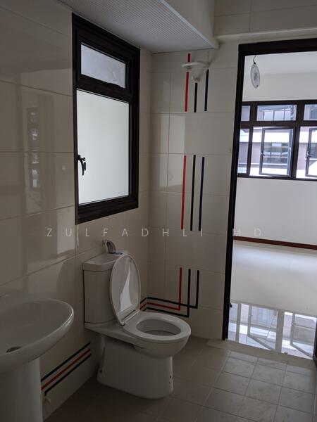 Spacious bathroom in original condition from HDB