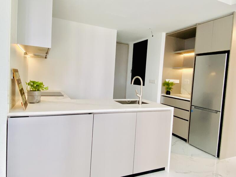 Kitchen with a storeroom at the back