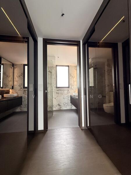 Elegant tinted glass wardrobes in Master