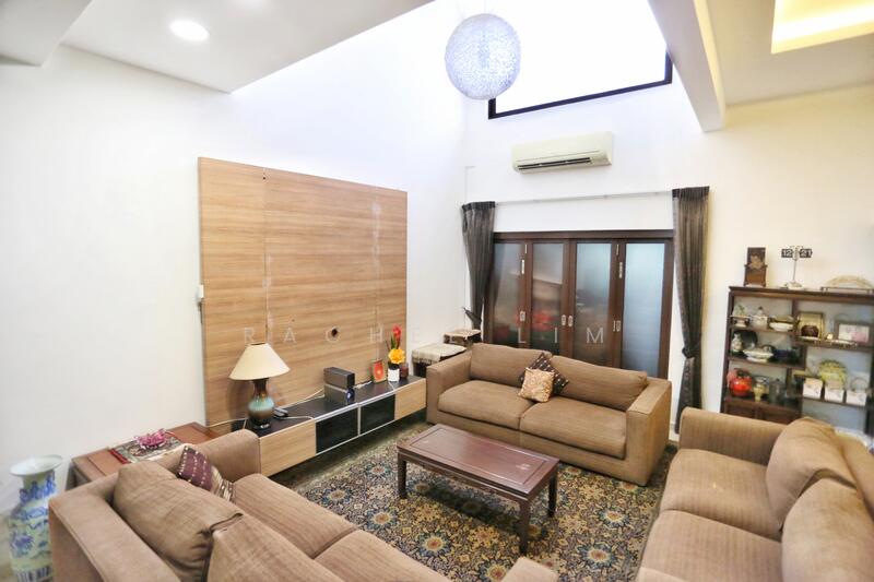 A bright, airy living room with high ceiling with natural light pouring in - A space for everyone